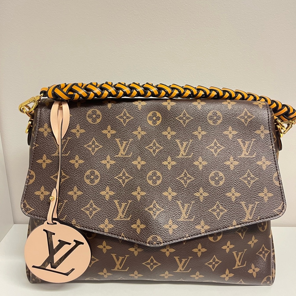 Louis Vuitton Beaubourg Handbag.